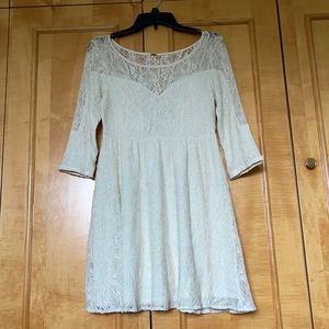 A gently Used XS Free People Cream Dress ☘️☘️